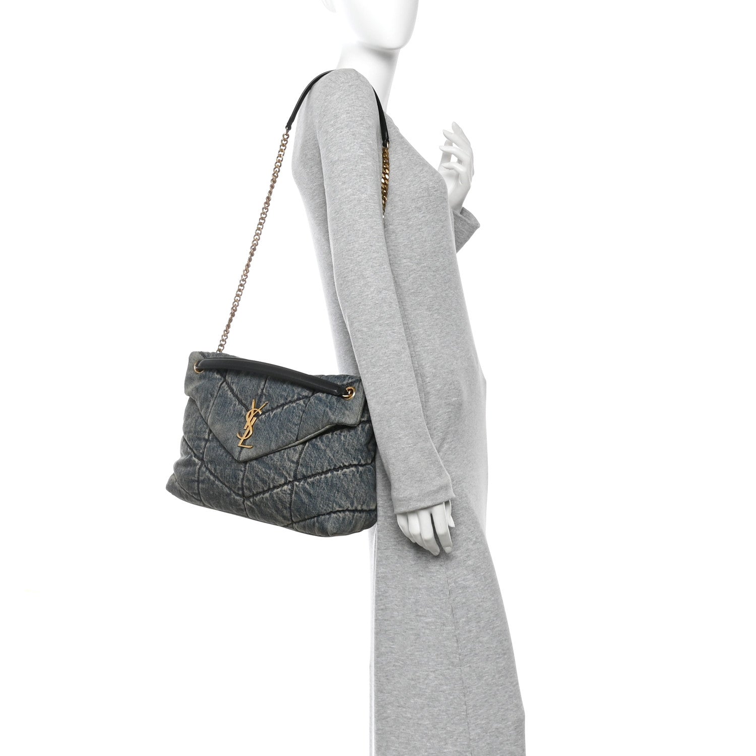 Denim quilted puffer satchel with gold chain strap shown on mannequin
