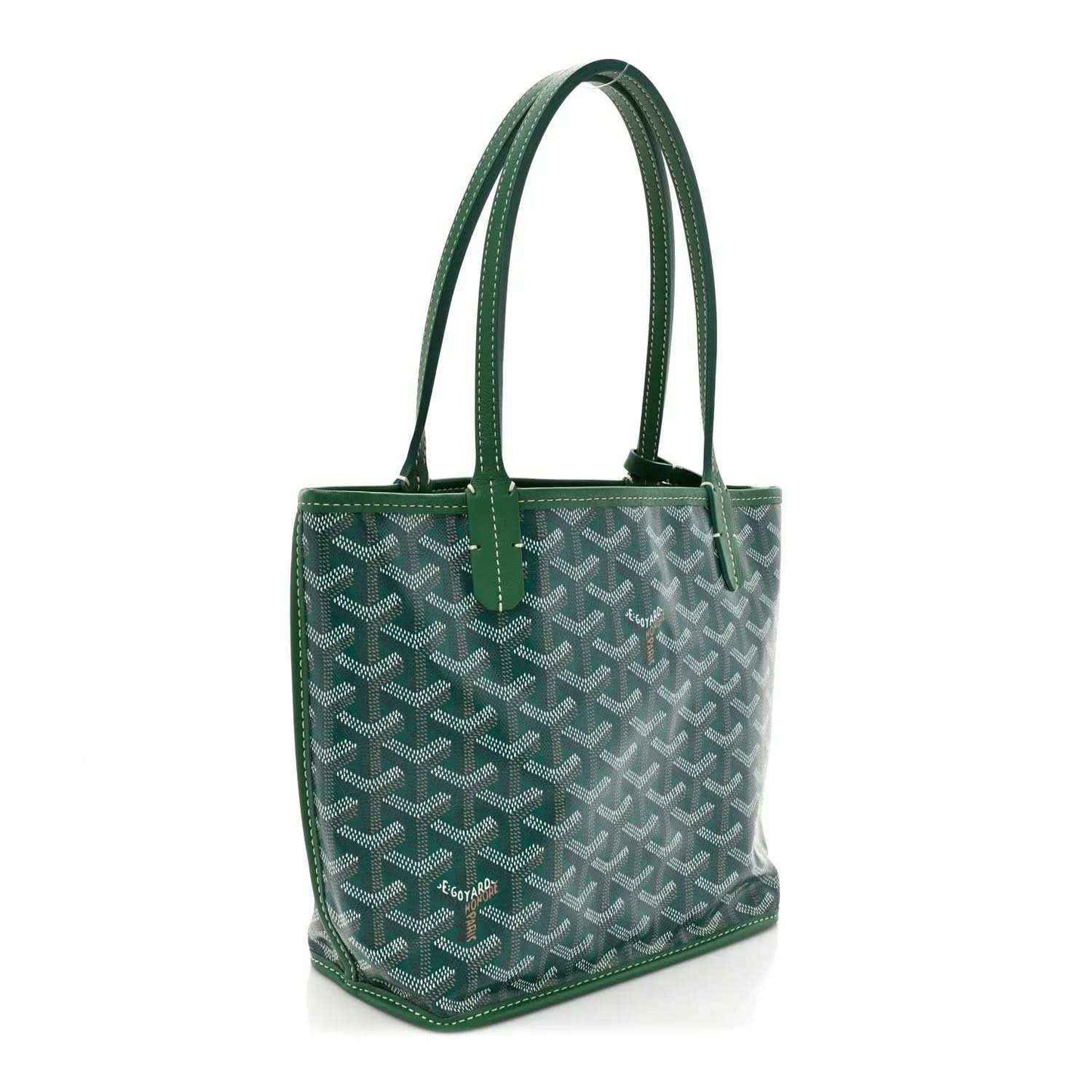 Green patterned mini tote bag with top handles and rounded corners