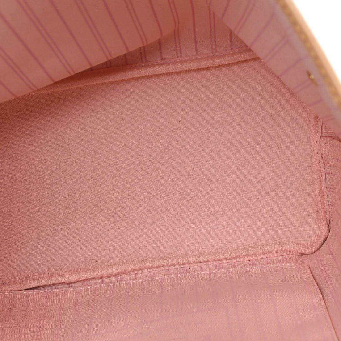 Louis Vuitton tote bag interior with light pink fabric lining
