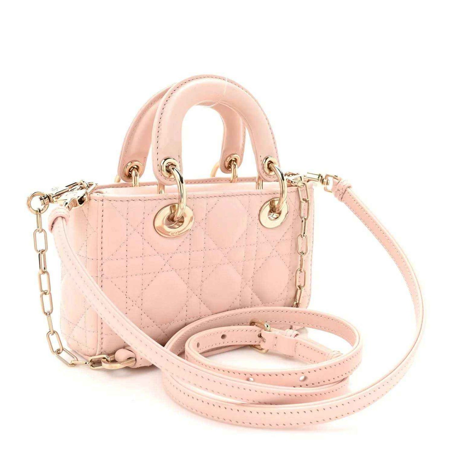Pink quilted leather mini handbag with top handles and adjustable chain strap