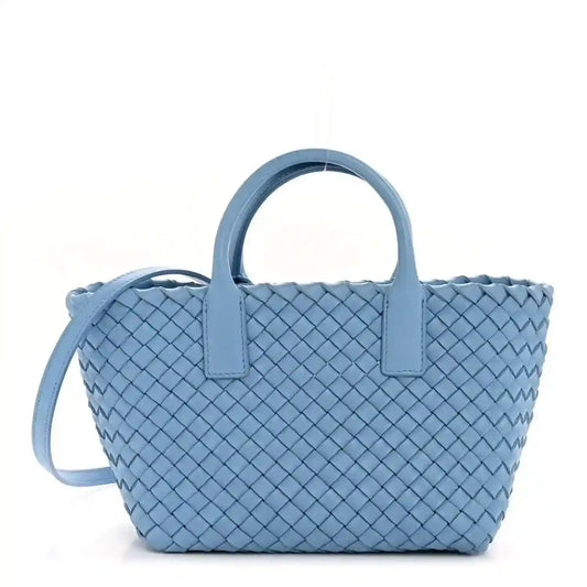 Blue intrecciato leather mini cabat tote with two top handles and woven pattern