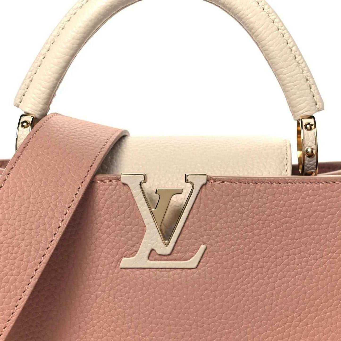 Rose leather handbag with cream trim and gold LV emblem on front