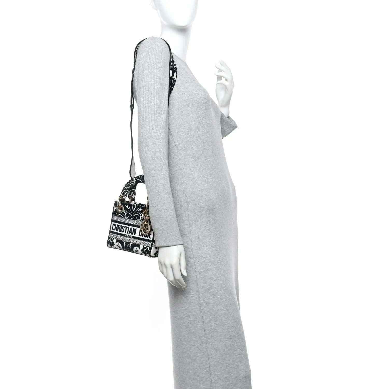 Mini embroidered canvas bag in black and white floral print with short shoulder strap
