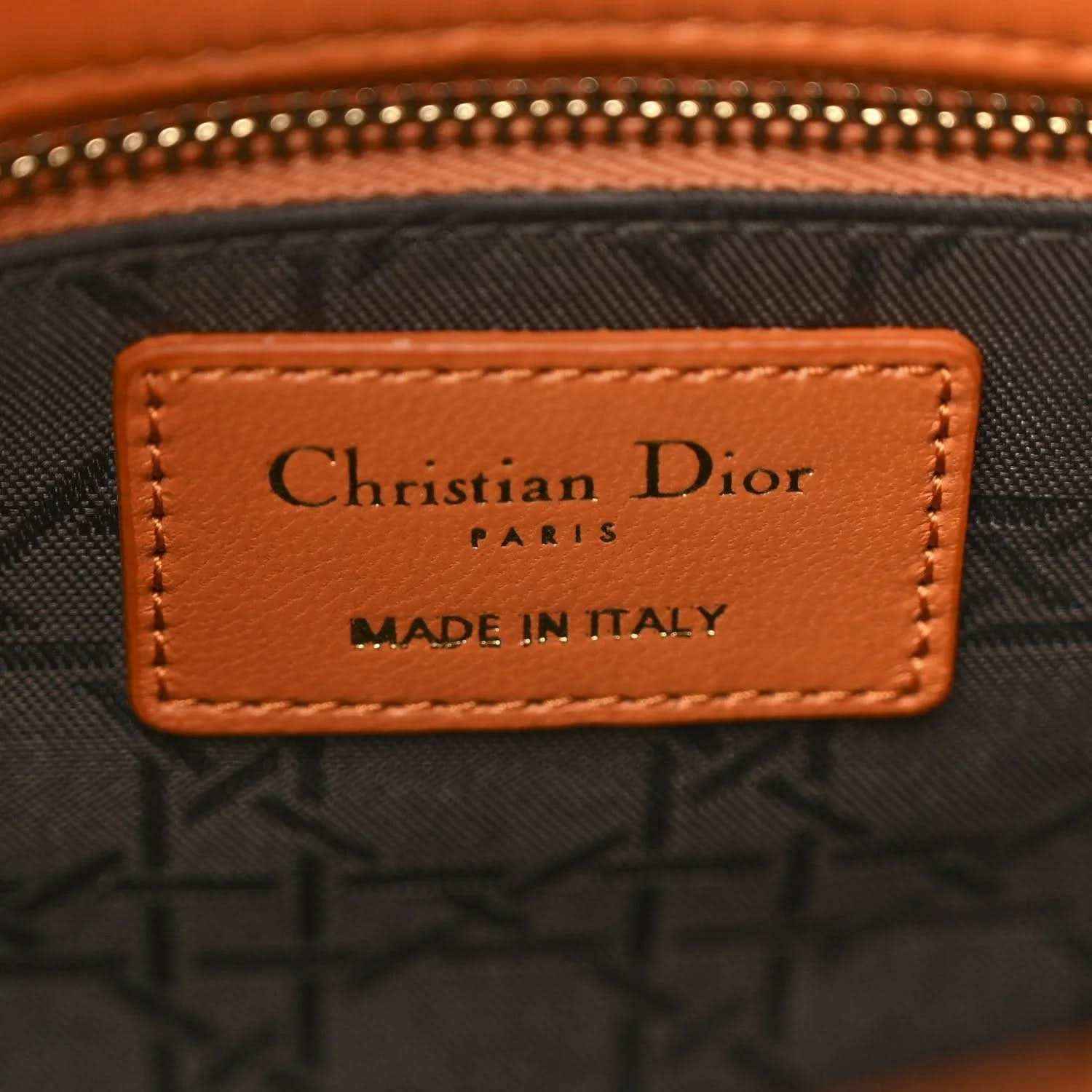 Christian Dior Paris label on inside of orange Lady Dior tote, made in Italy