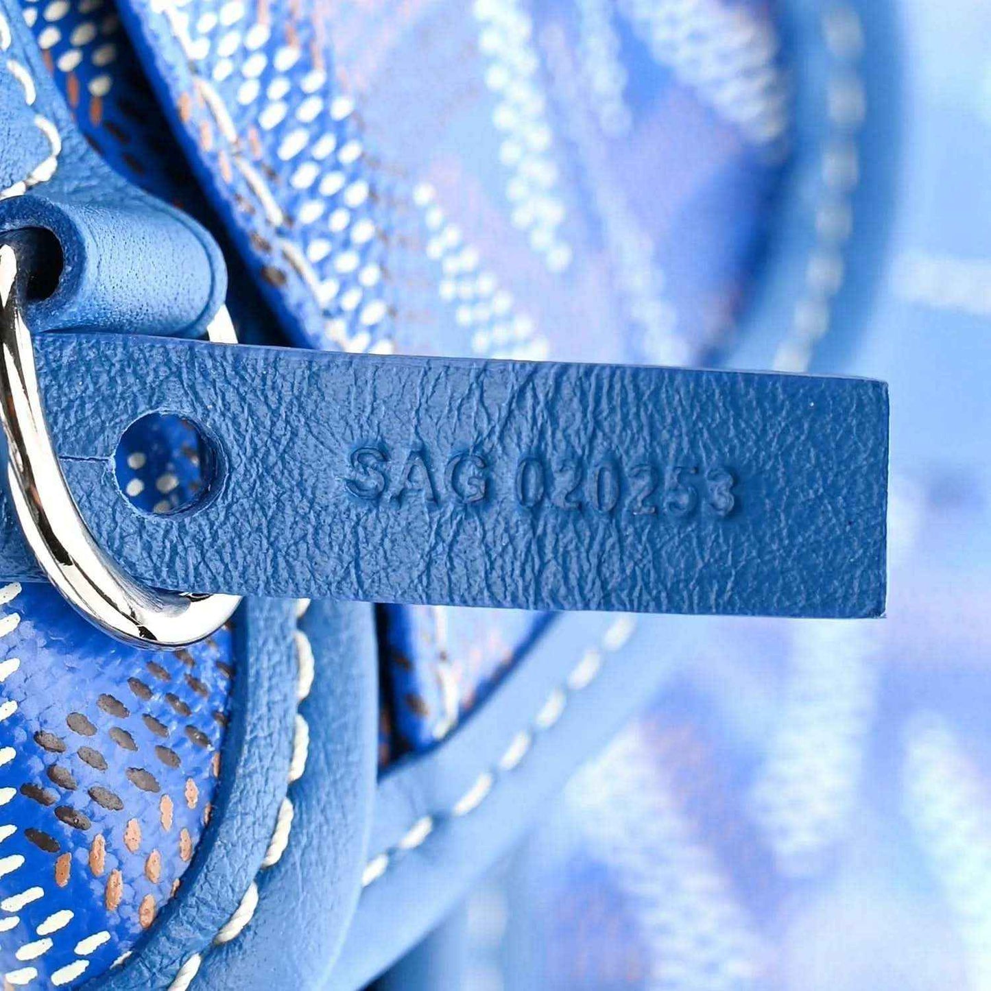 Mini reversible tote bag, blue leather strap with embossed lettering and metal hardware