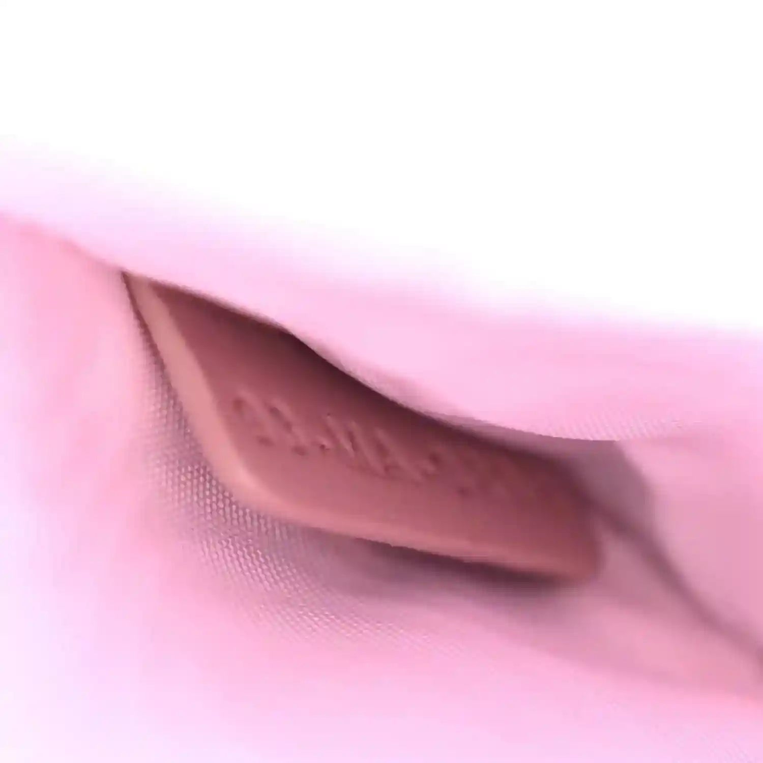 Closeup of purple leather interior lining near the flap opening