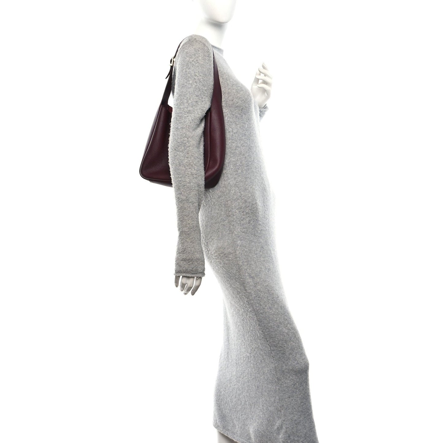 Burgundy leather hobo bag with short top handle, shown on a mannequin