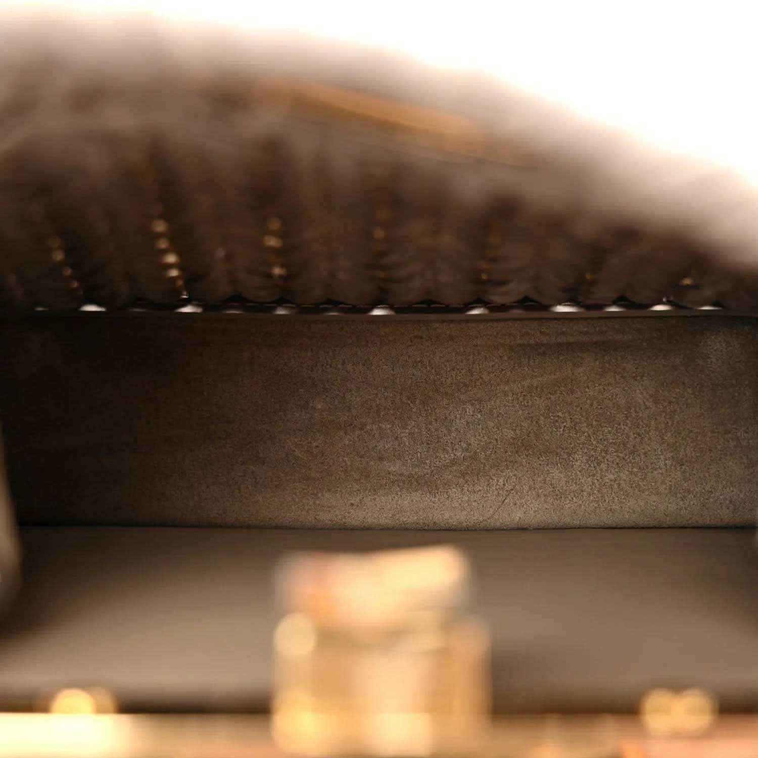 Leather satchel interior lining with stitched edge