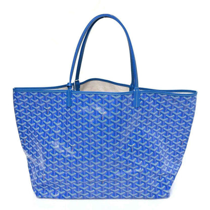 Sky blue Goyardine GM tote bag with woven Goyard pattern and blue leather trim.