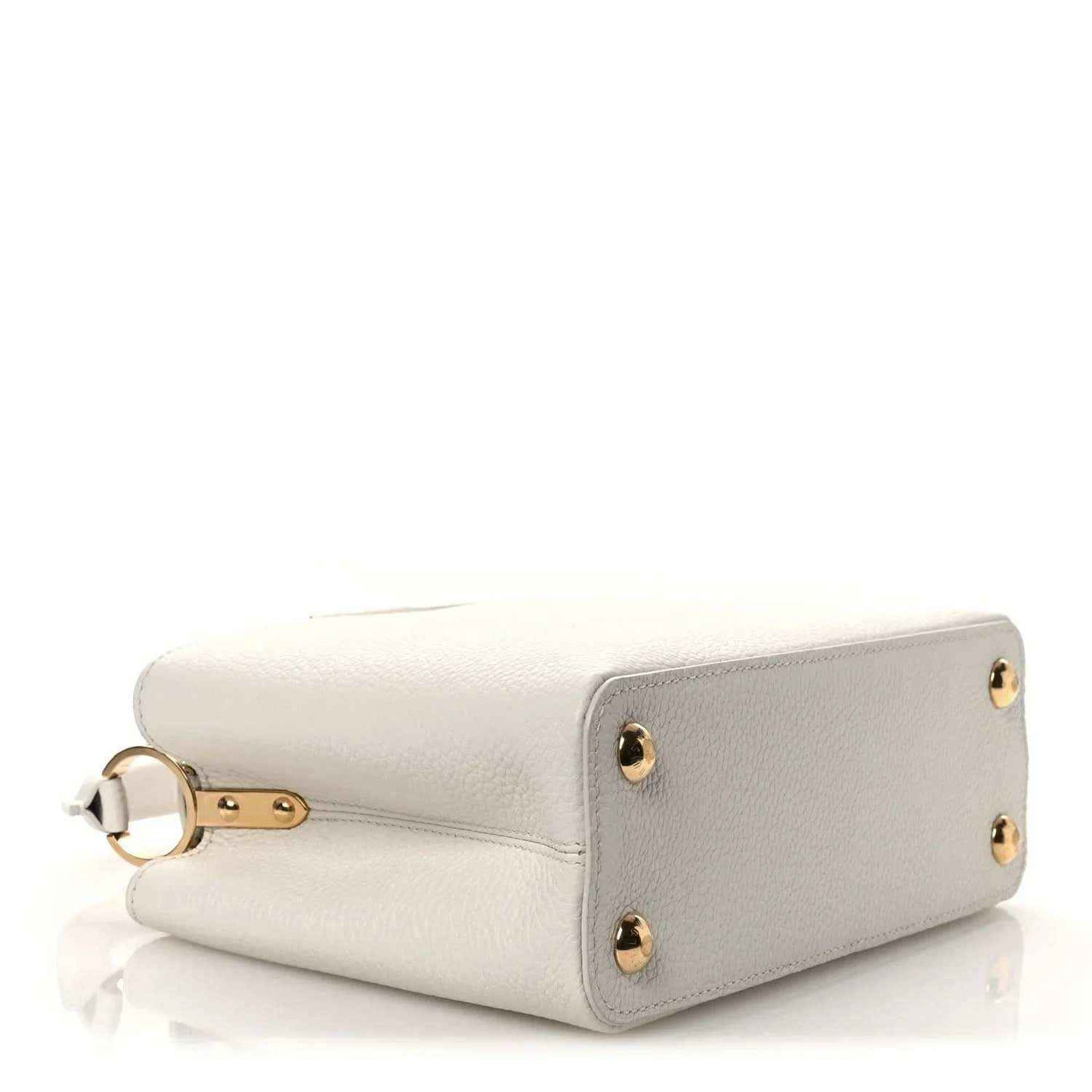 Louis Vuitton Capucines BB leather handbag with gold-tone corner studs and top handle