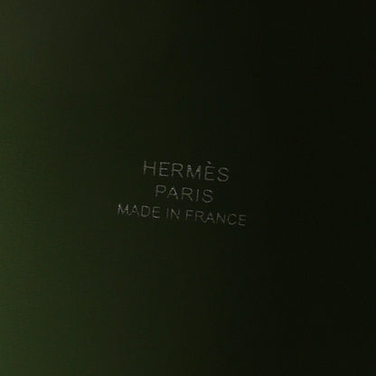 Green leather interior with embossed text reading PARIS and MADE IN FRANCE