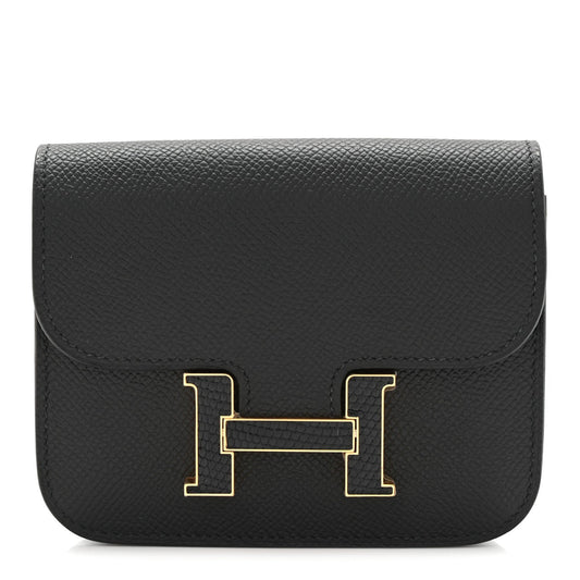 Black slim wallet with gold H clasp, textured epsom leather foldover