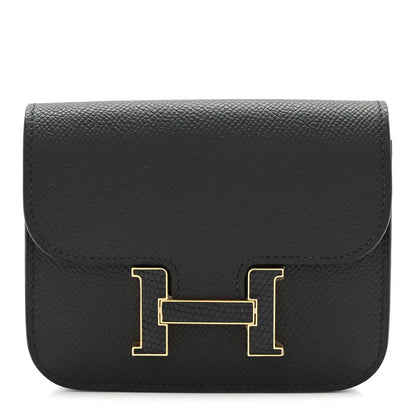 Black slim wallet with gold H clasp, textured epsom leather foldover