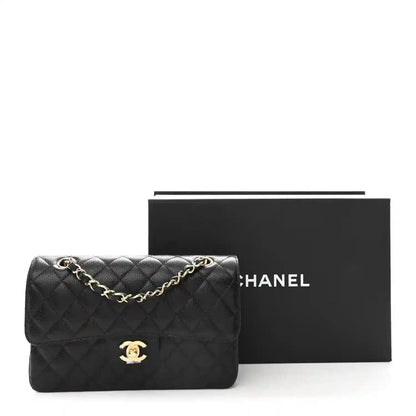Chanel quilted black leather small double flap bag with gold chain strap