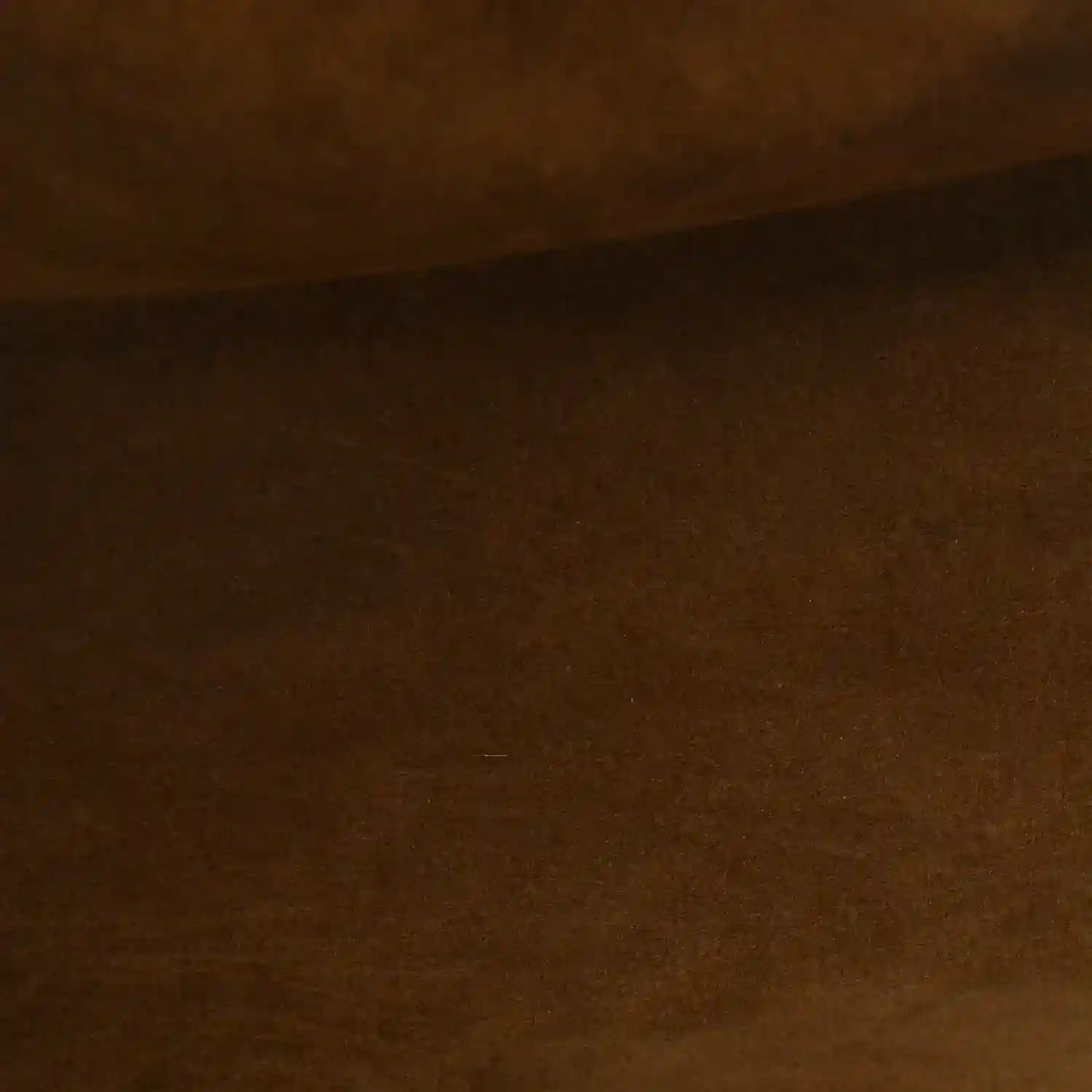 Calfskin leather texture in dark brown tone