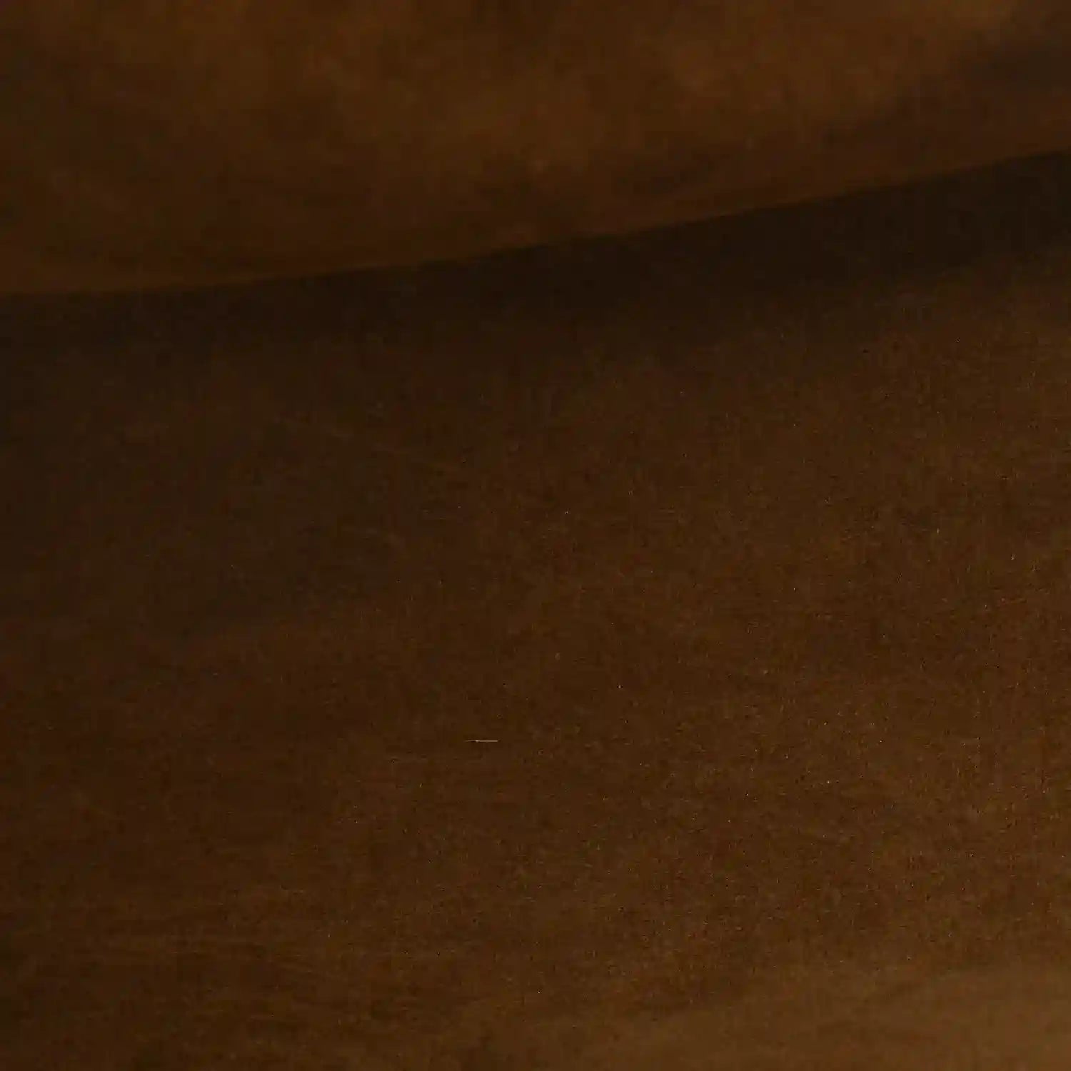 Calfskin leather texture in dark brown tone