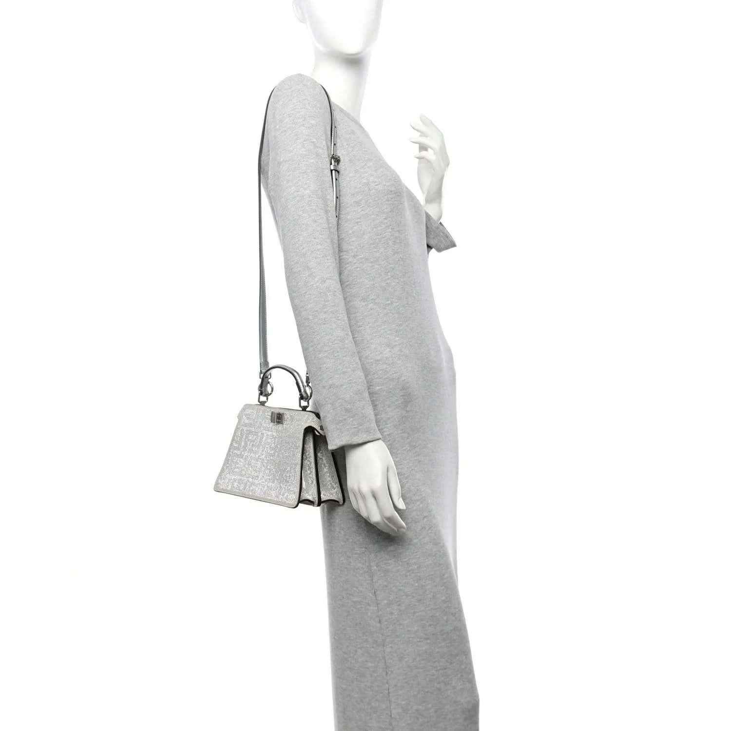 Silver crystal mini satchel worn crossbody with thin shoulder strap