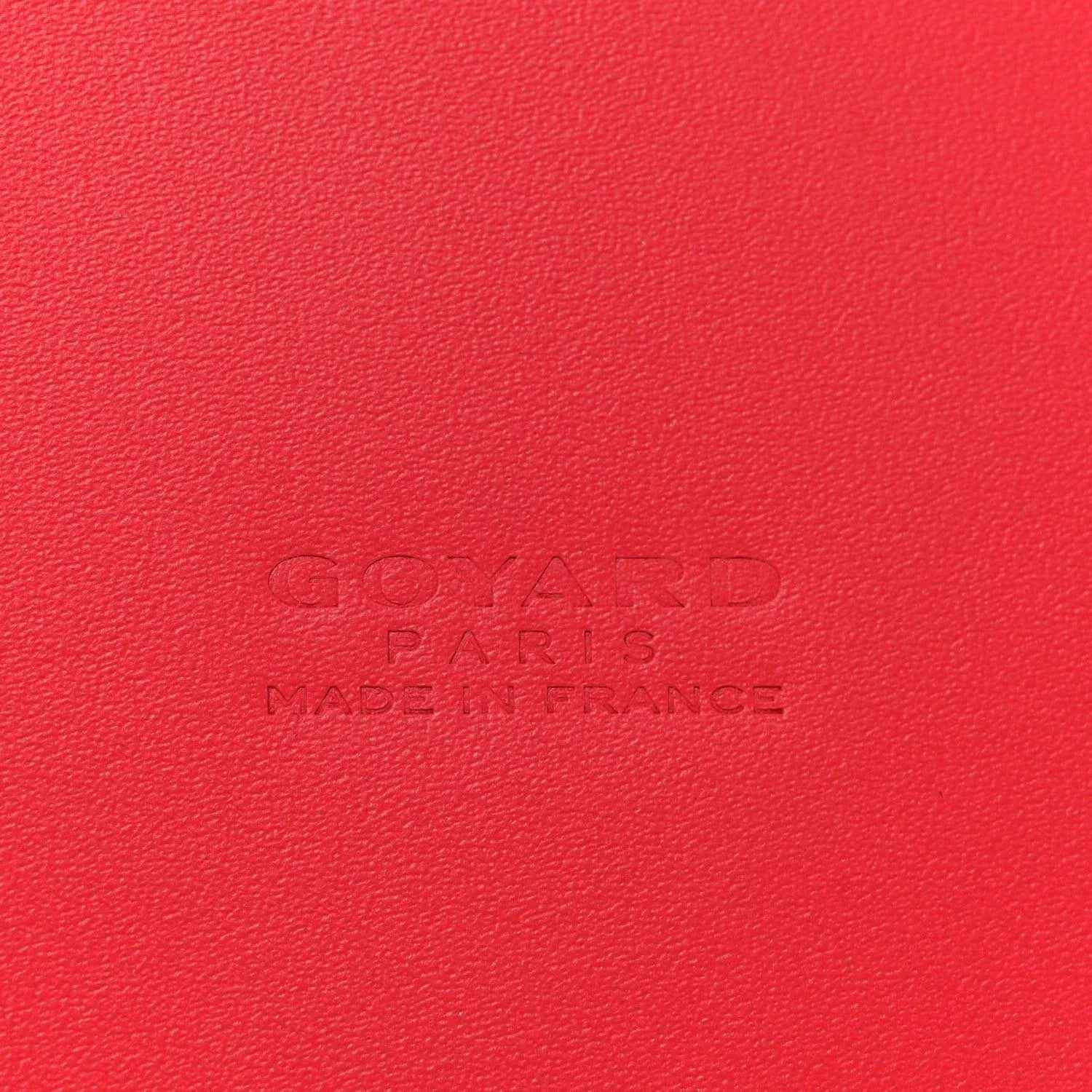 Red leather handbag panel with embossed Goyard Paris branding