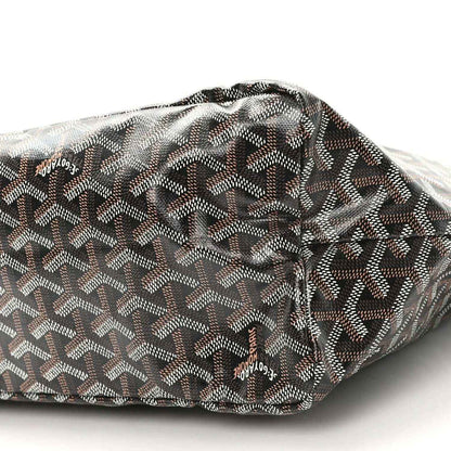 Black Goyard tote fabric with geometric pattern and stitched rolled top, close-up