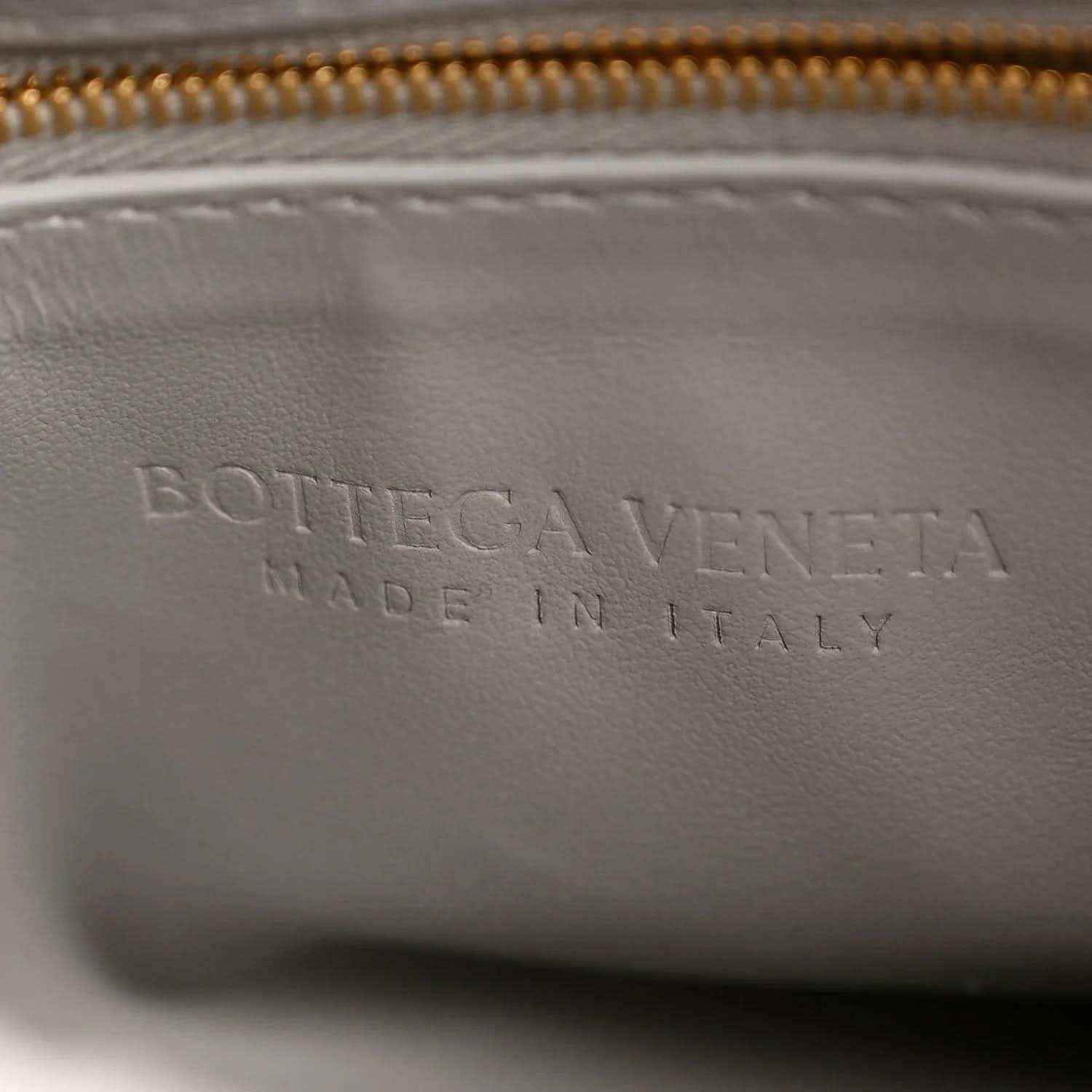 Bottega Veneta suede interior panel with embossed lettering