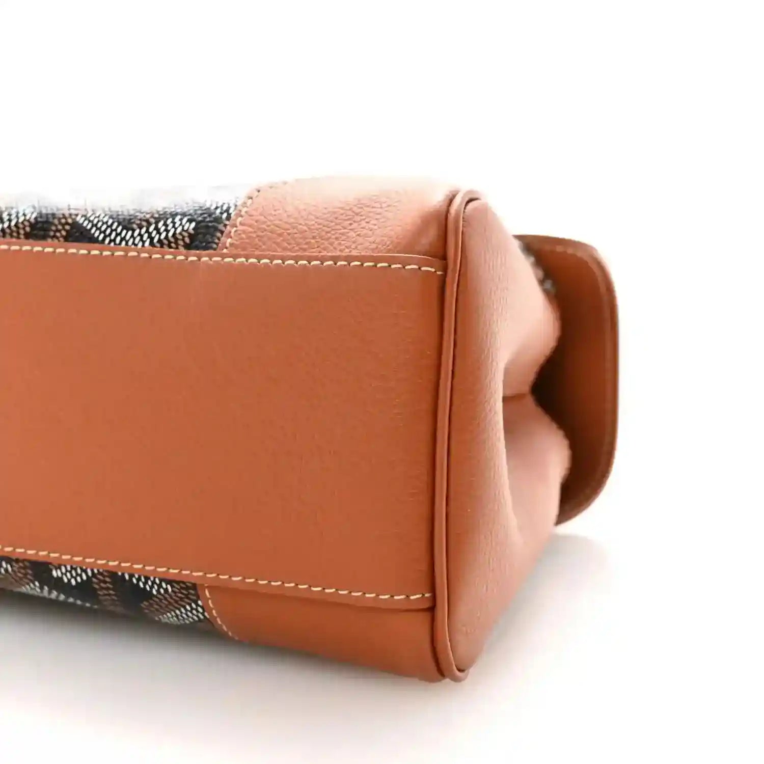 Mini Saigon shoulder bag end close-up, tan leather flap and contrast stitching