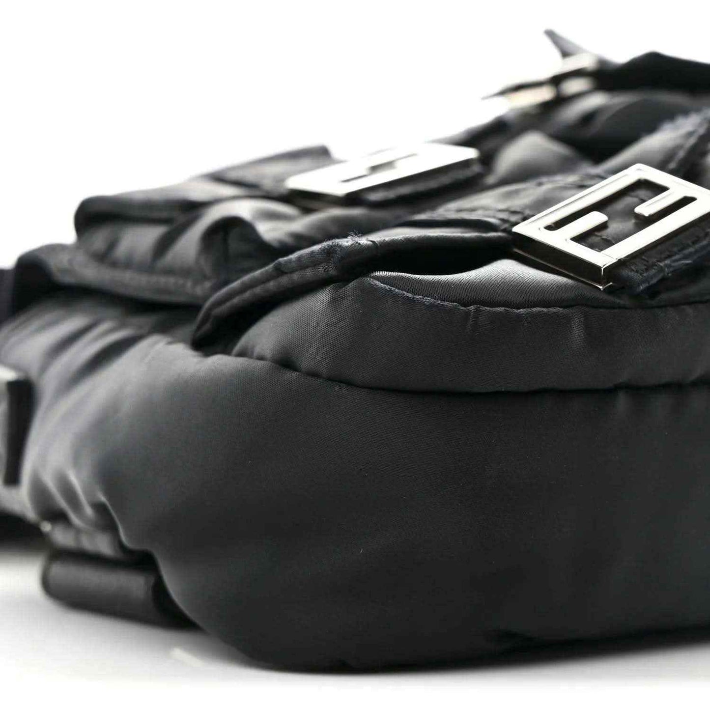 Fendi Econyl black nylon baguette bag close-up of logo hardware and padded texture