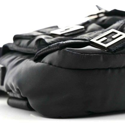 Fendi Econyl black nylon baguette bag close-up of logo hardware and padded texture