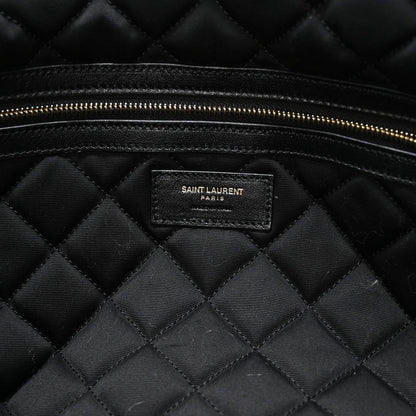 Black quilted lining with Saint Laurent PARIS brand patch and gold zipper