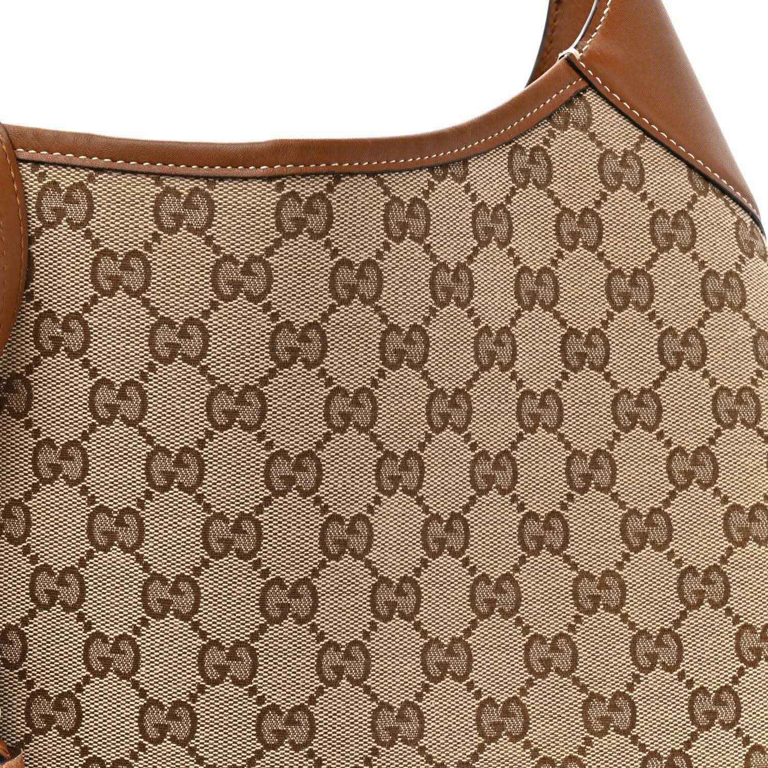 Brown GG monogram canvas panel with leather piping along top edge
