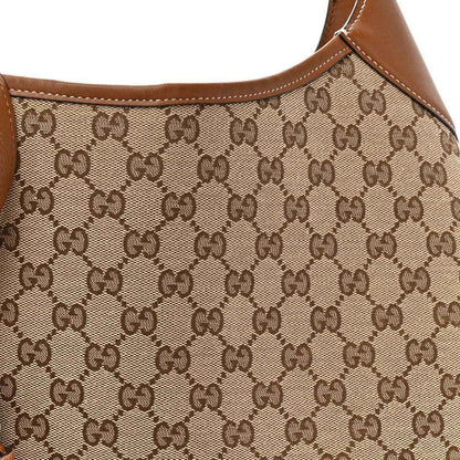 Brown GG monogram canvas panel with leather piping along top edge