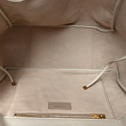 Tote bag interior in light suede with zip top and stitched opening