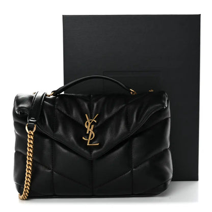 Black quilted lambskin puffer satchel with gold chain strap and YSL monogram on flap