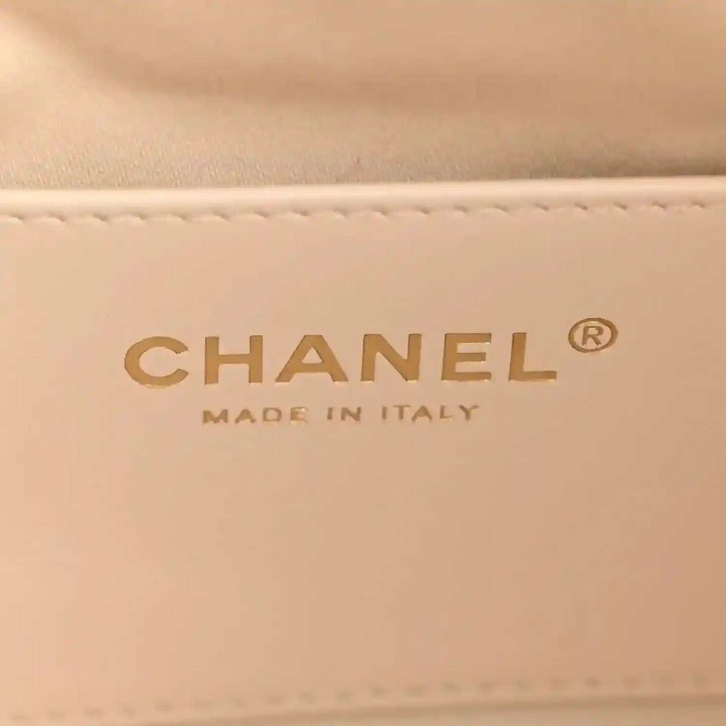 CHANEL logo with "MADE IN ITALY" on light leather lining