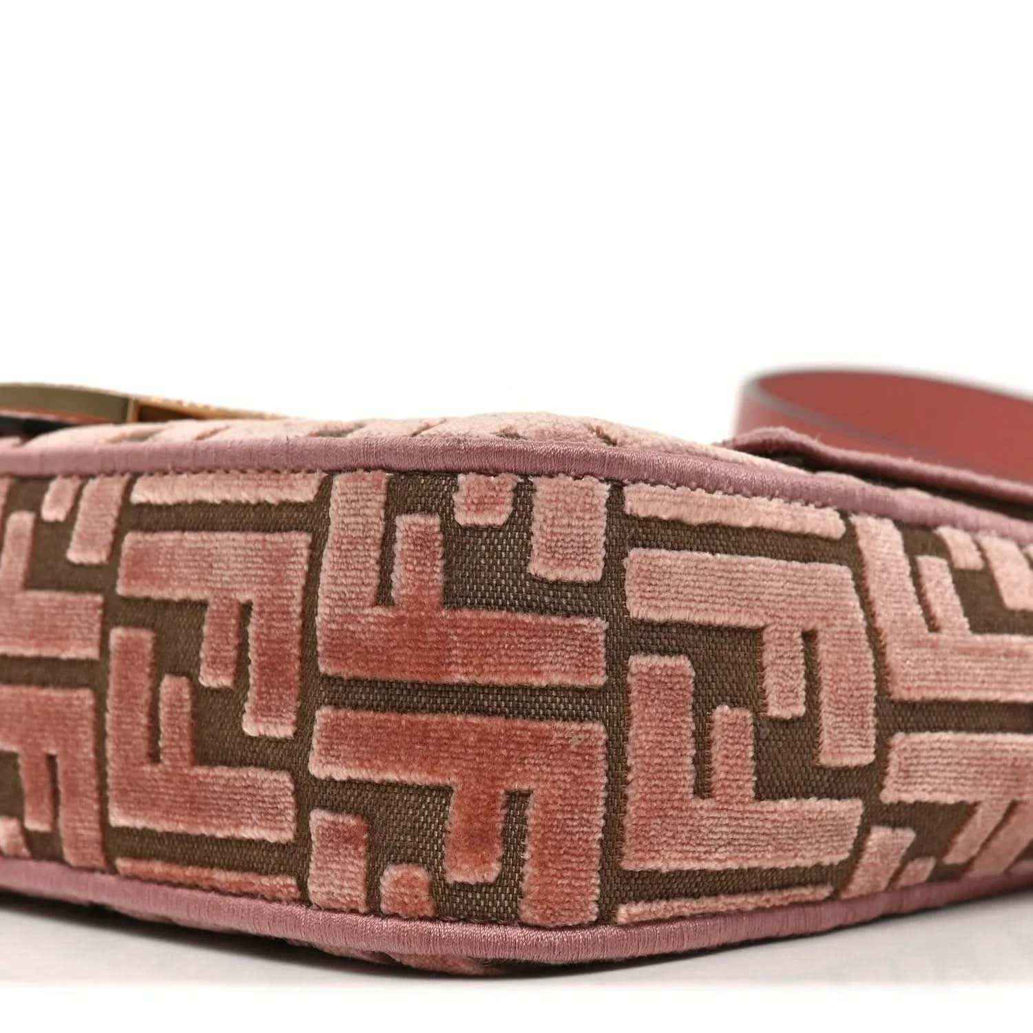 Pink velvet jacquard baguette bag base corner with repeating FF pattern stitching