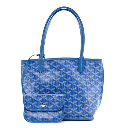 Sky blue patterned mini tote bag with front flap pocket and top handles
