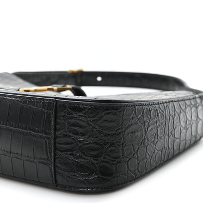 Black embossed calfskin hobo bag with structured sides and top opening edge