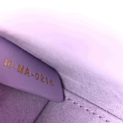 Lilac leather date code '10-MA-0219' with stitched edge