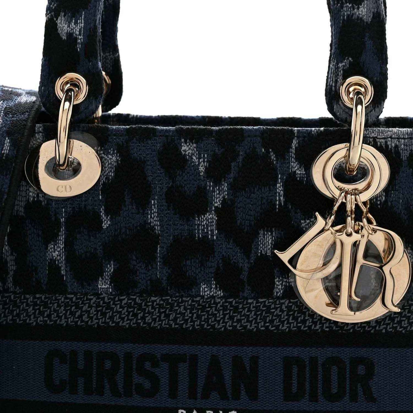 Christian Dior handbag with top handles, Dior charm, and logo panel
