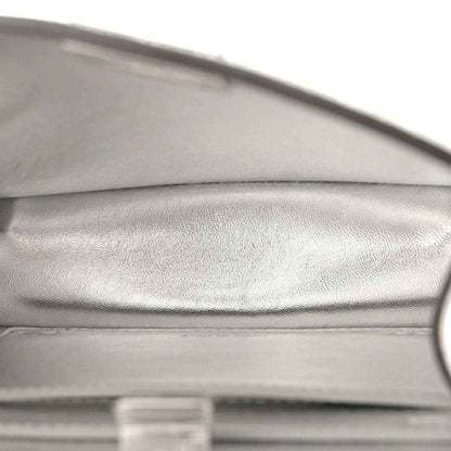 Light silver leather satchel lining with visible edge seam