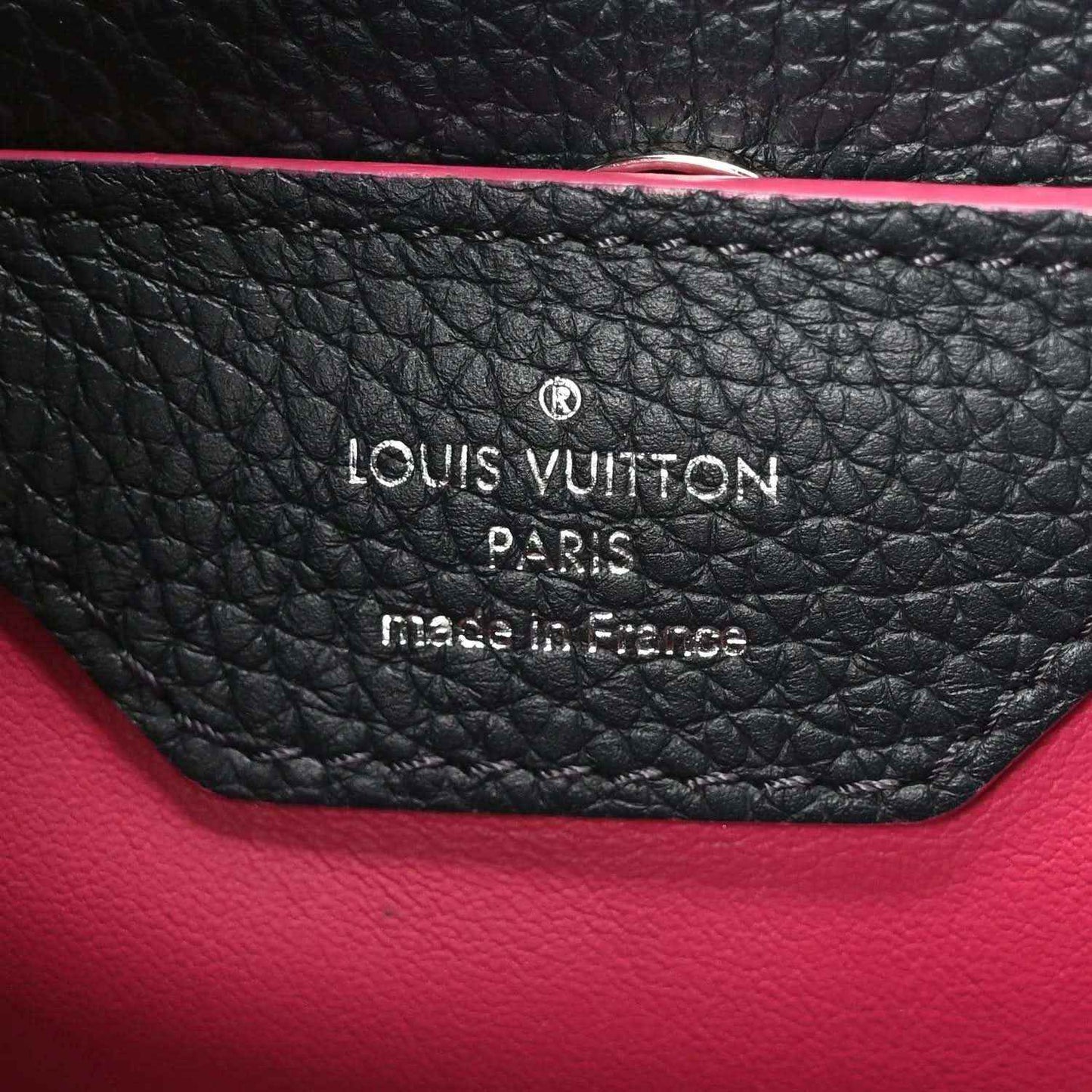Louis Vuitton Capucines PM leather interior stamp, dark pebbled leather with fuchsia trim edge