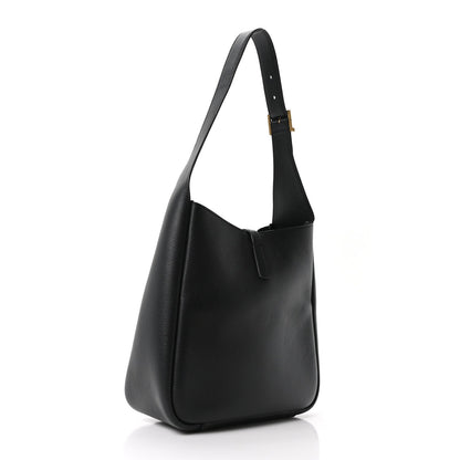 Black smooth calfskin soft hobo bag with single top handle and curved silhouette
