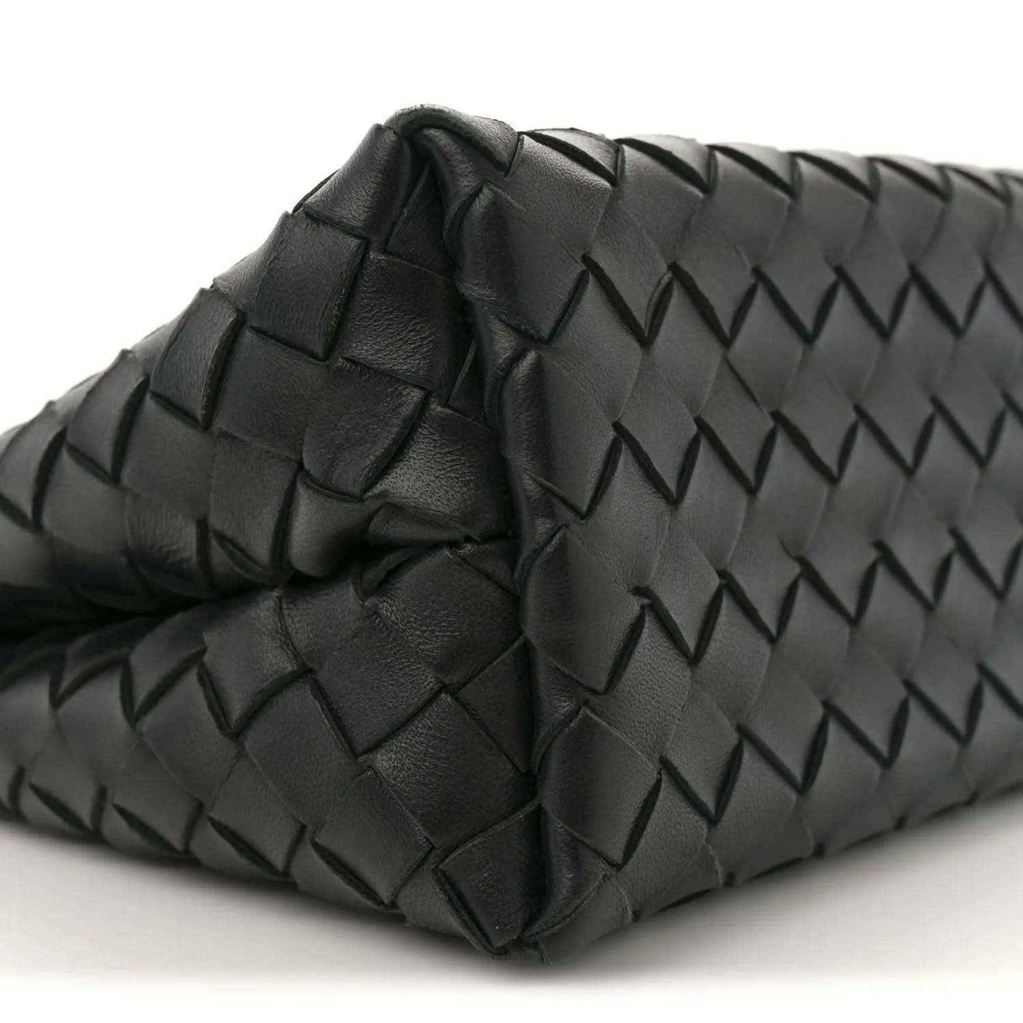 Black leather shoulder bag corner with raised intrecciato weave and quilted detail