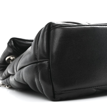 Black quilted lambskin puffer small satchel, structured flap and curved edge seam detail.