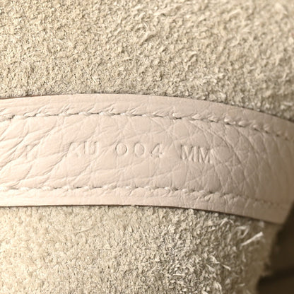 Pale cream leather lining with embossed size marking, side panel close-up