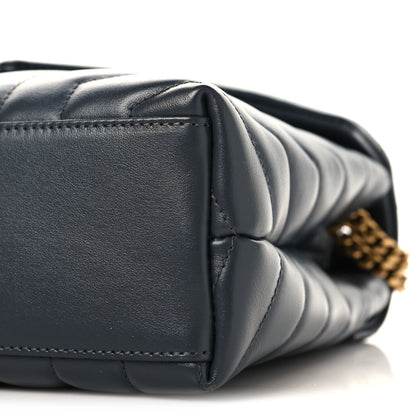 Saint Laurent quilted leather satchel end panel with gold chain detail, dark blue