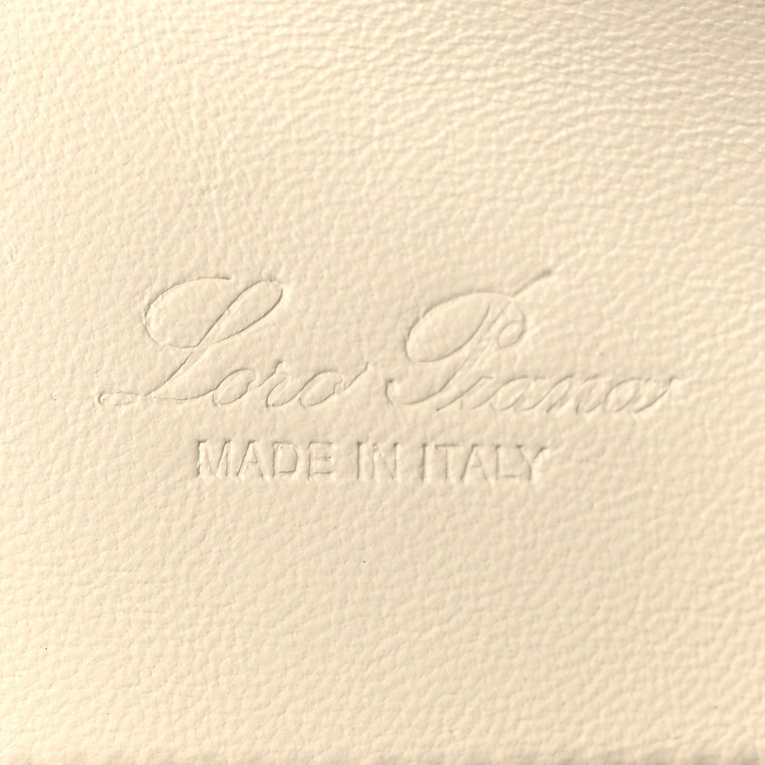 Embossed leather logo text and 'MADE IN ITALY' on grained calfskin
