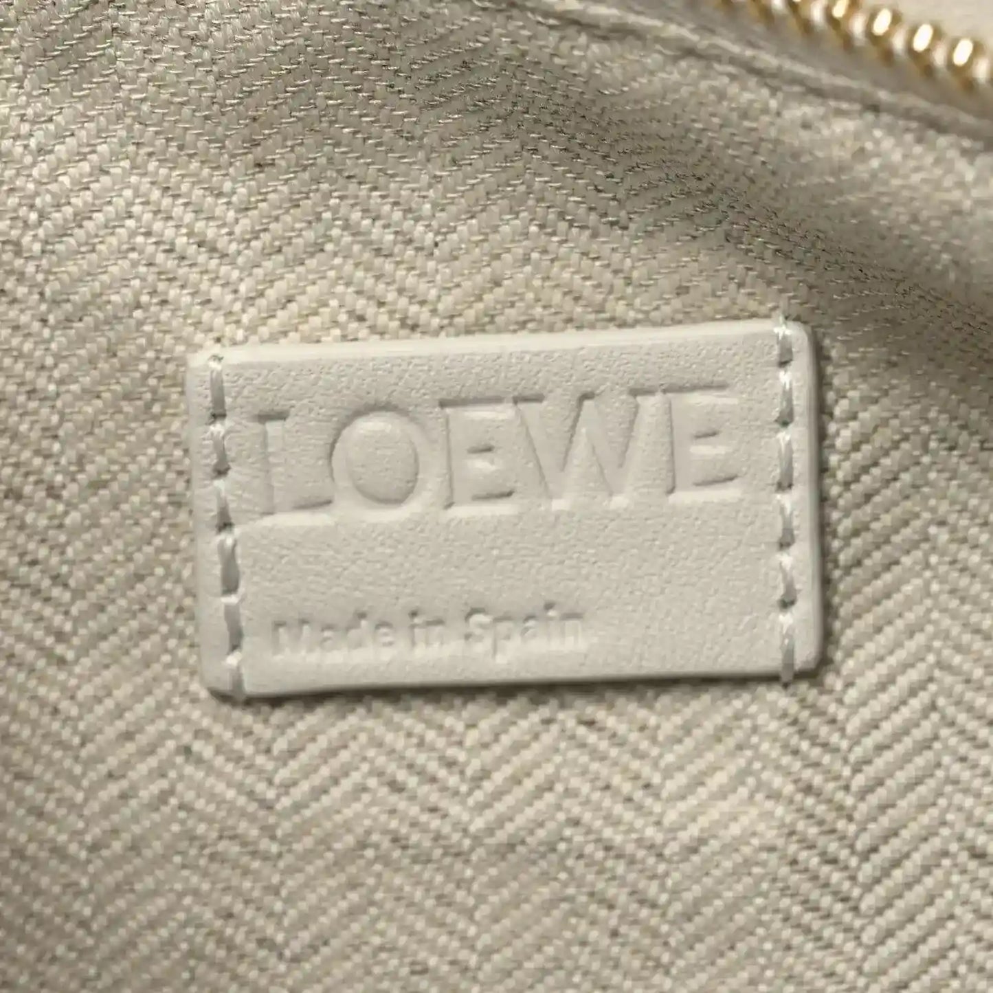Small Puzzle edge bag leather label reading LOEWE and Made in Spain