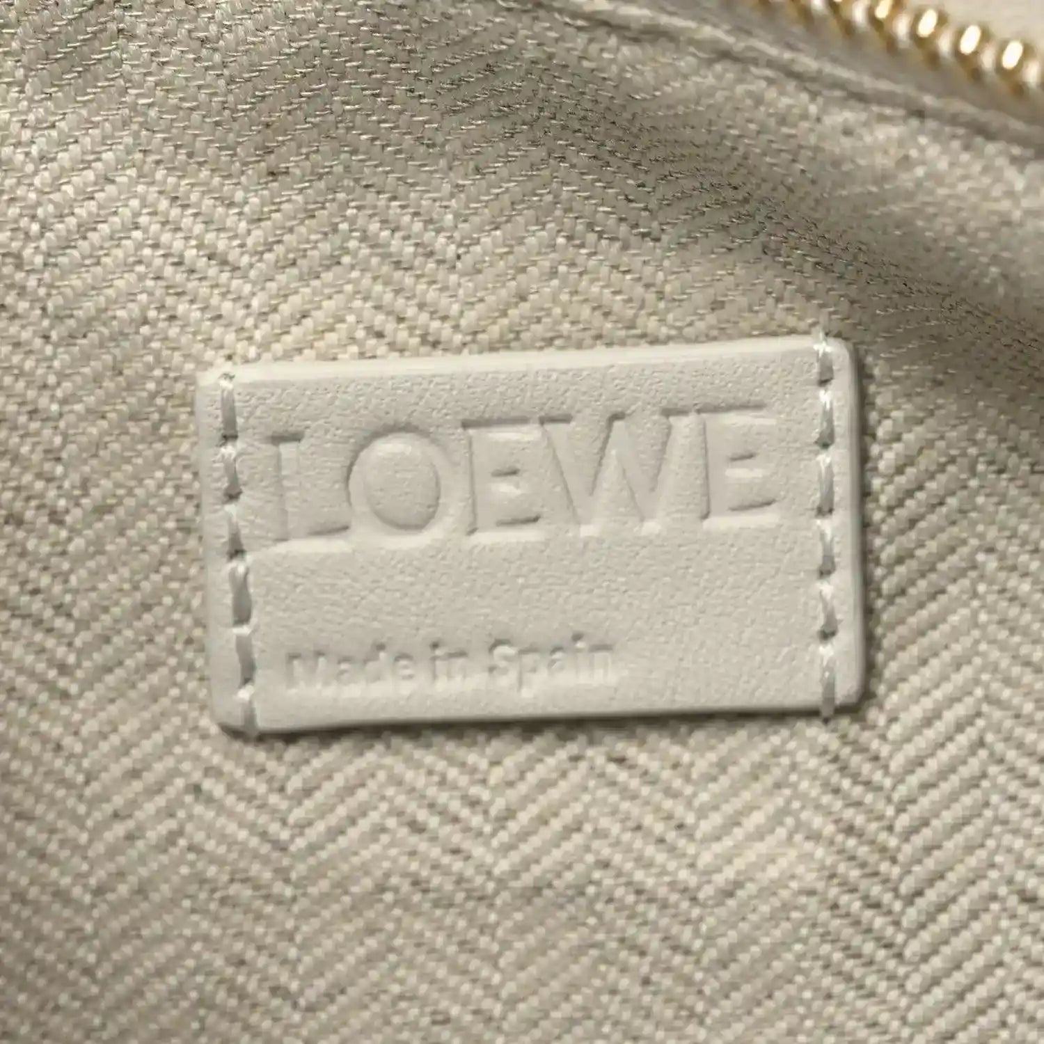 Small Puzzle edge bag leather label reading LOEWE and Made in Spain