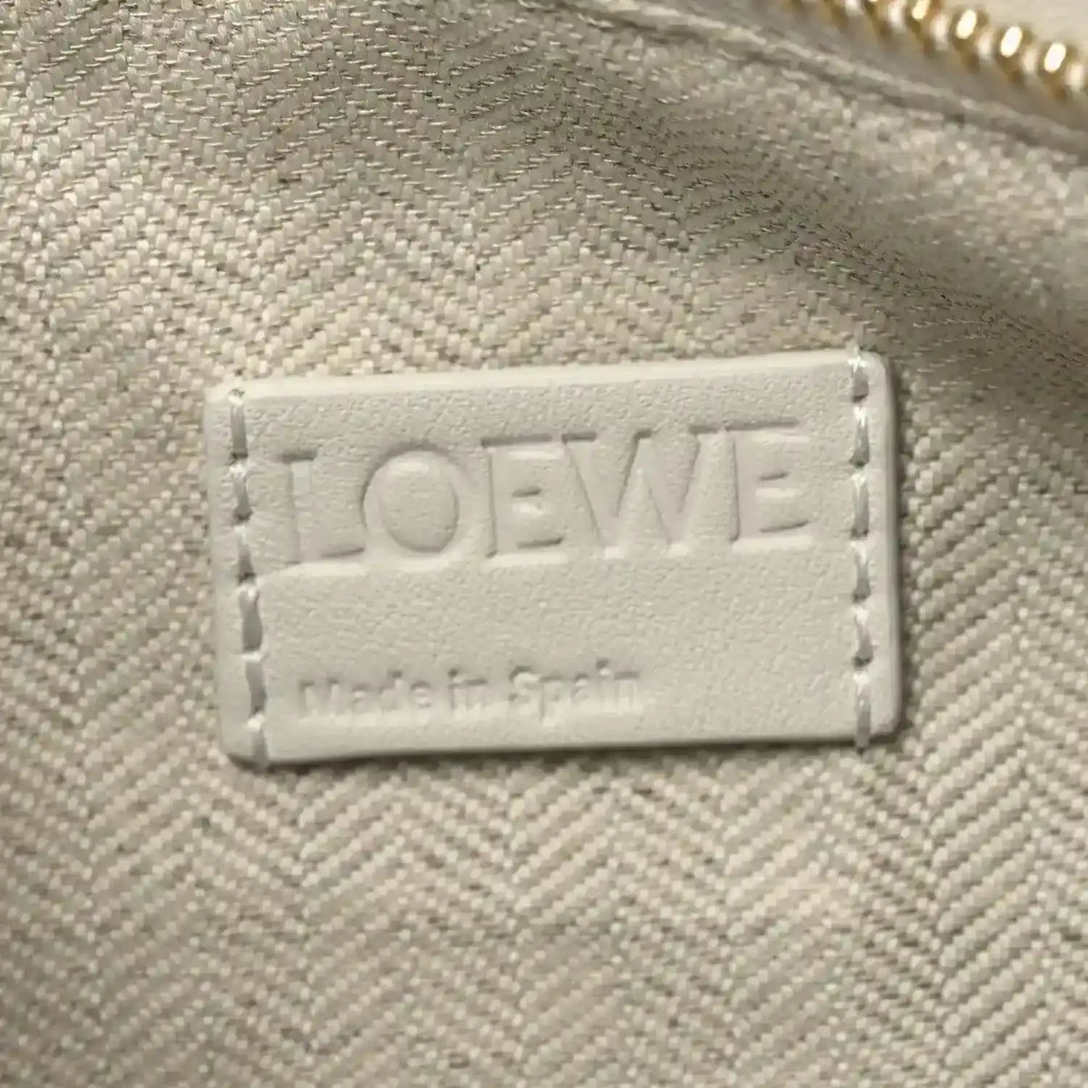 Small Puzzle edge bag leather label reading LOEWE and Made in Spain