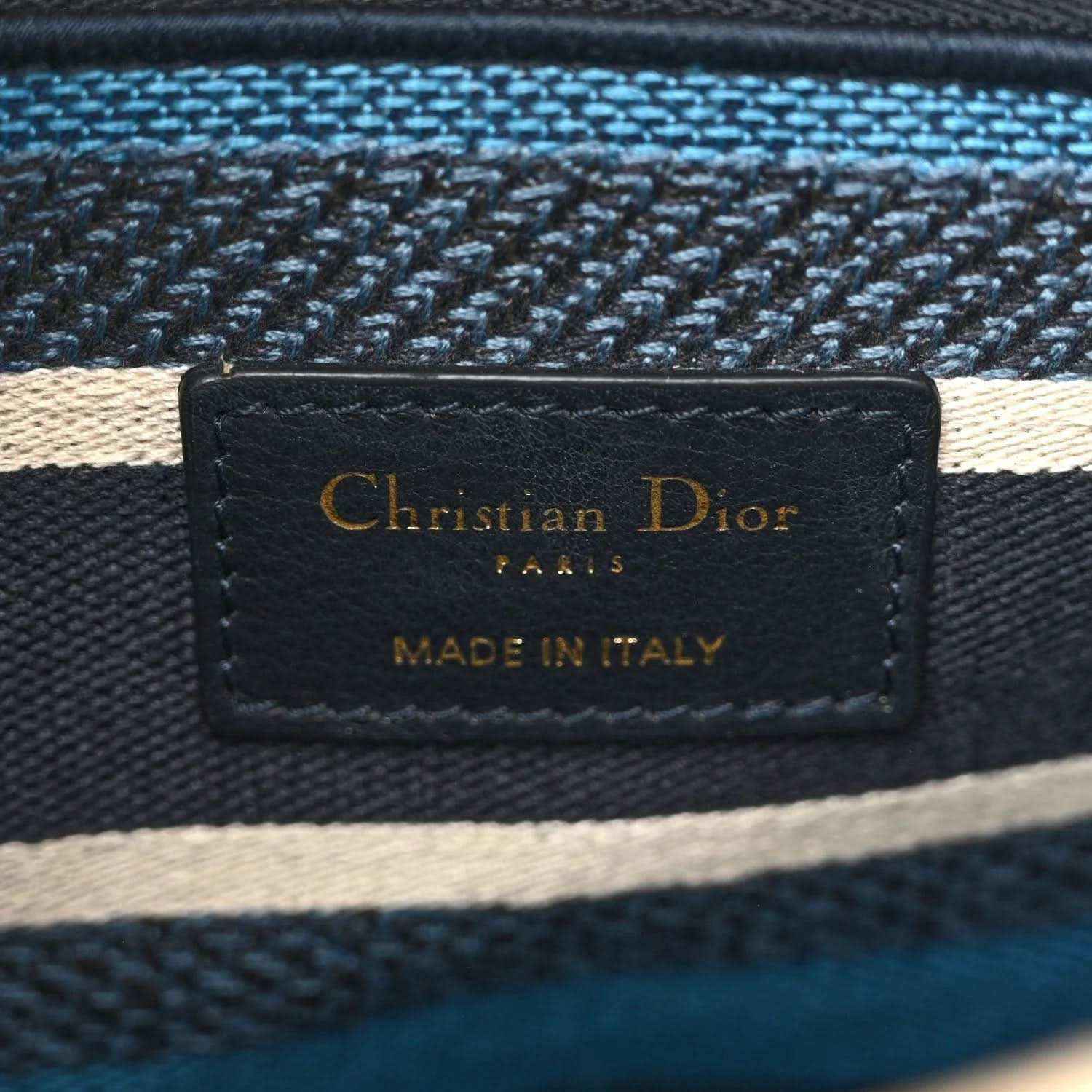 Interior label patch reading Christian Dior, Paris, made in Italy, on navy fabric
